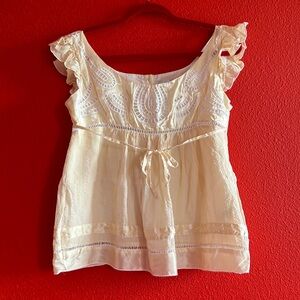 Bebe size L pretty light yellow top